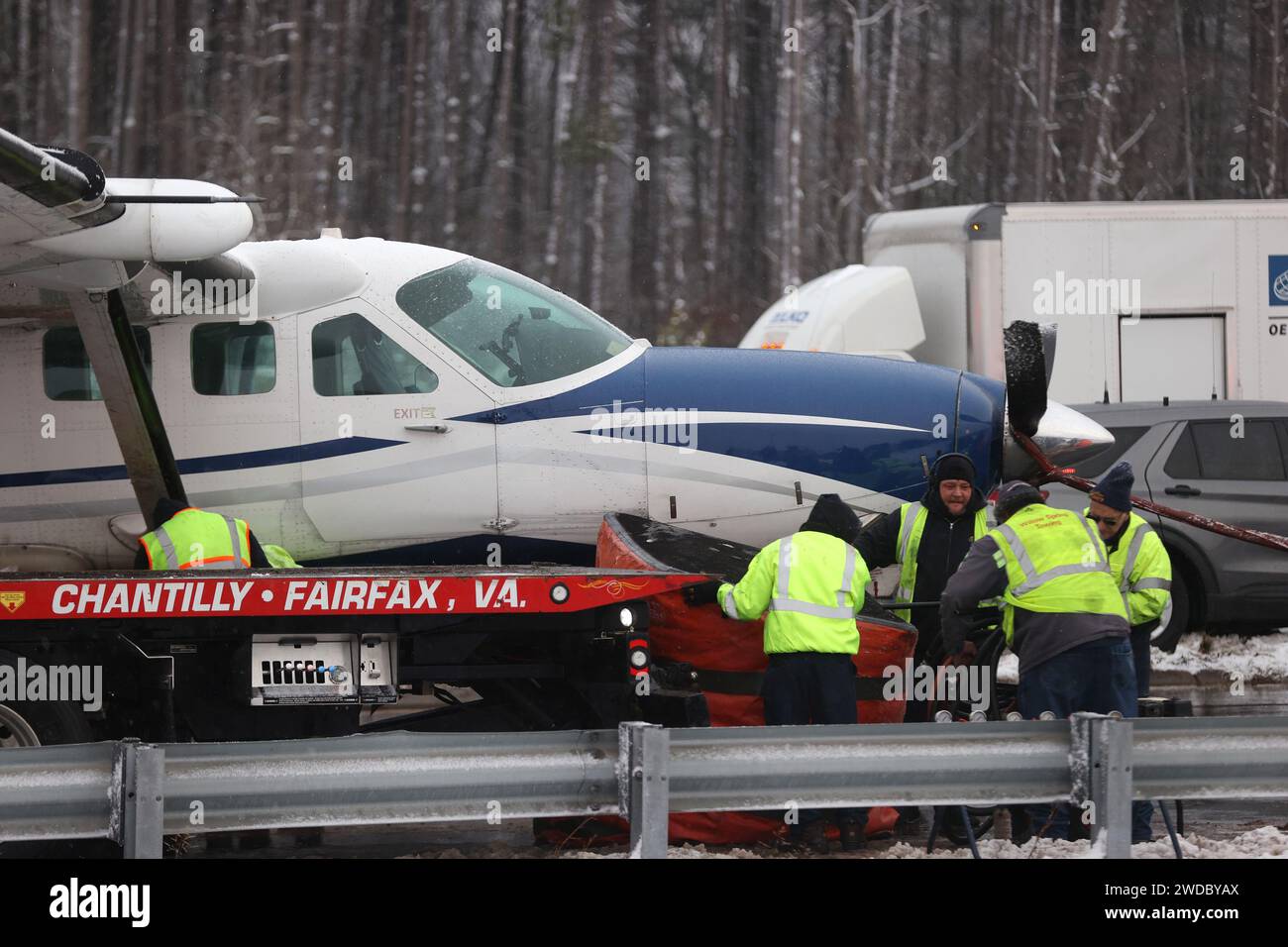 Loudon County, PA, USA. 19th Jan, 2024. Emergency team on hand as a Cessna passenger plane headed for Lancaster, Pennsylvania made an emergency landing on Loudoun County Parkway in Virginia after taking off from nearby Washington Dulles International Airport on January 19, 2024. No injuries were reported with five passengers and two crew member on board. Loudon County, Virginia. Credit: Mpi34/Media Punch/Alamy Live News Stock Photo