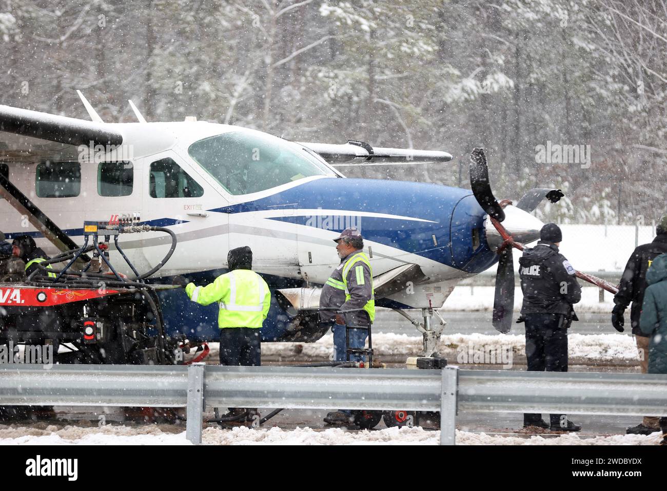 Loudon County, PA, USA. 19th Jan, 2024. Emergency team on hand as a Cessna passenger plane headed for Lancaster, Pennsylvania made an emergency landing on Loudoun County Parkway in Virginia after taking off from nearby Washington Dulles International Airport on January 19, 2024. No injuries were reported with five passengers and two crew member on board. Loudon County, Virginia. Credit: Mpi34/Media Punch/Alamy Live News Stock Photo
