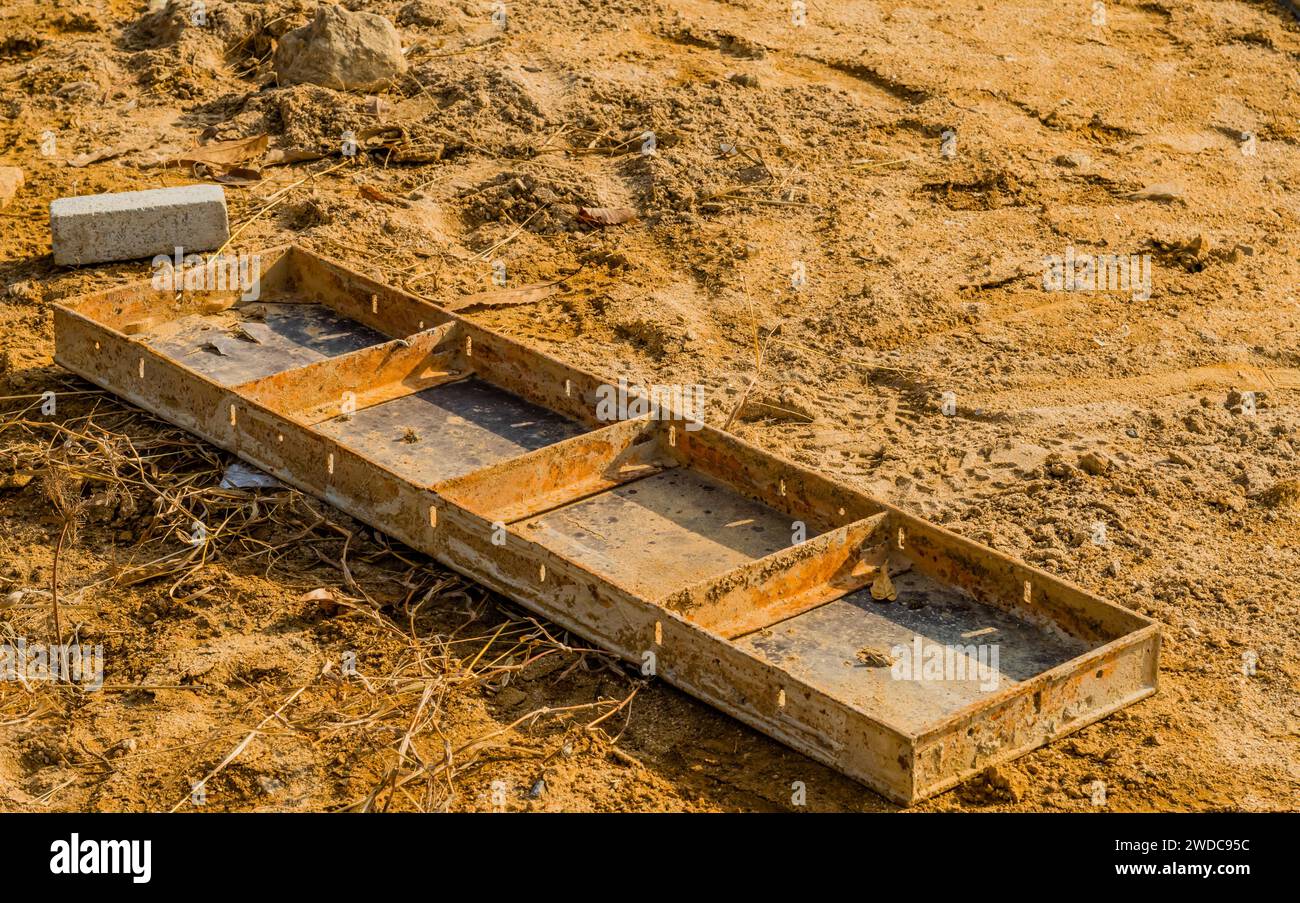 Closeup of concrete form on ground of construction site, South Korea