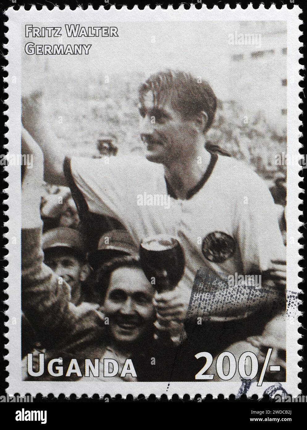 Fritz Walter with the World Cup of 1954 on postage stamp Stock Photo