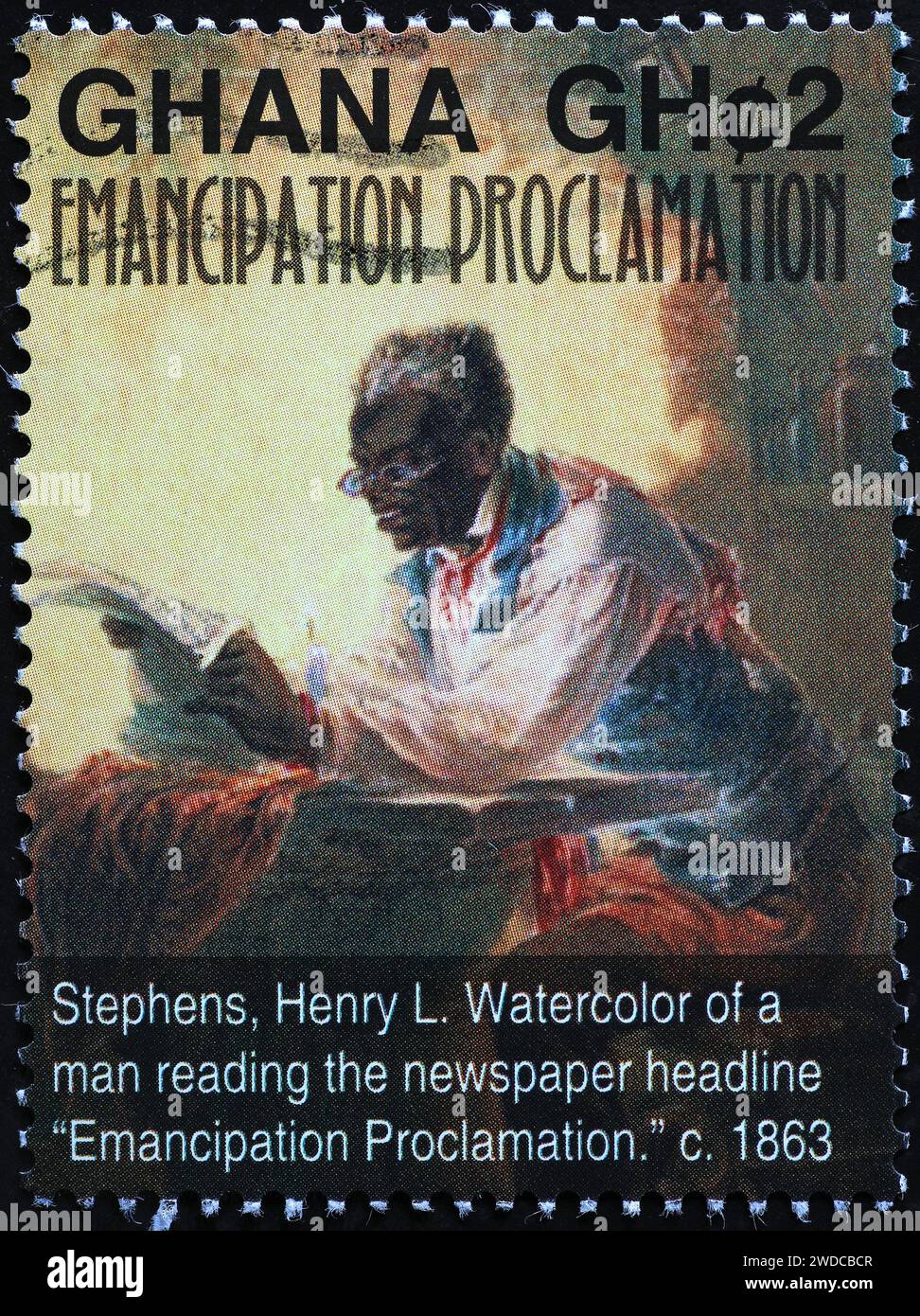 Painting of a black man reading the emancipation proclamation on stamp Stock Photo