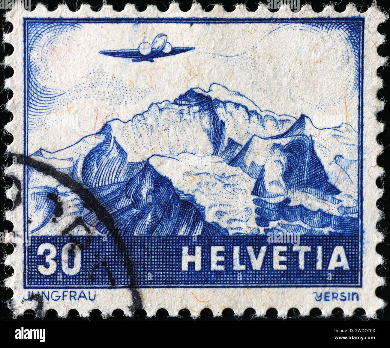 Old swiss postage stamp with the Jungfrau mountain Stock Photo