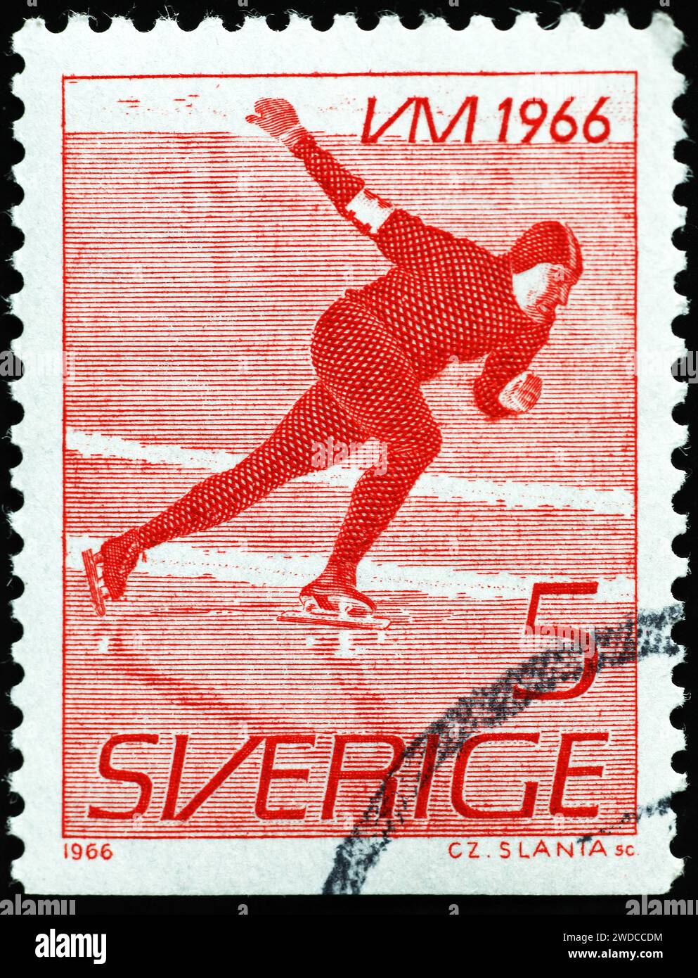 Speed skater on vintage swedish stamp Stock Photo