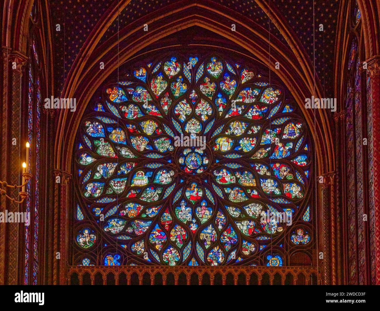 Colourful stained glass window in Gothic style in a church with intricate patterns, Sainte Chapelle. Paris Stock Photo