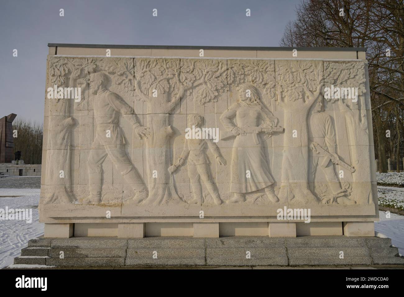 Sarcophagus with stone relief, Theme: Destruction and Suffering in the Soviet Union, Soviet Memorial, Winter, Treptower Park, Treptow Stock Photo