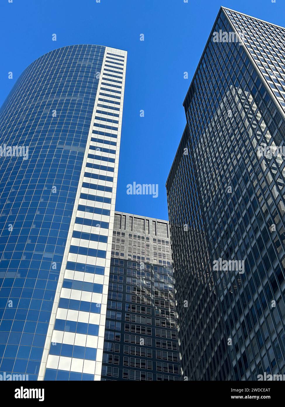 Low angle view of two modern skyscrapers, Financial District, New York City, New York, USA Stock Photo