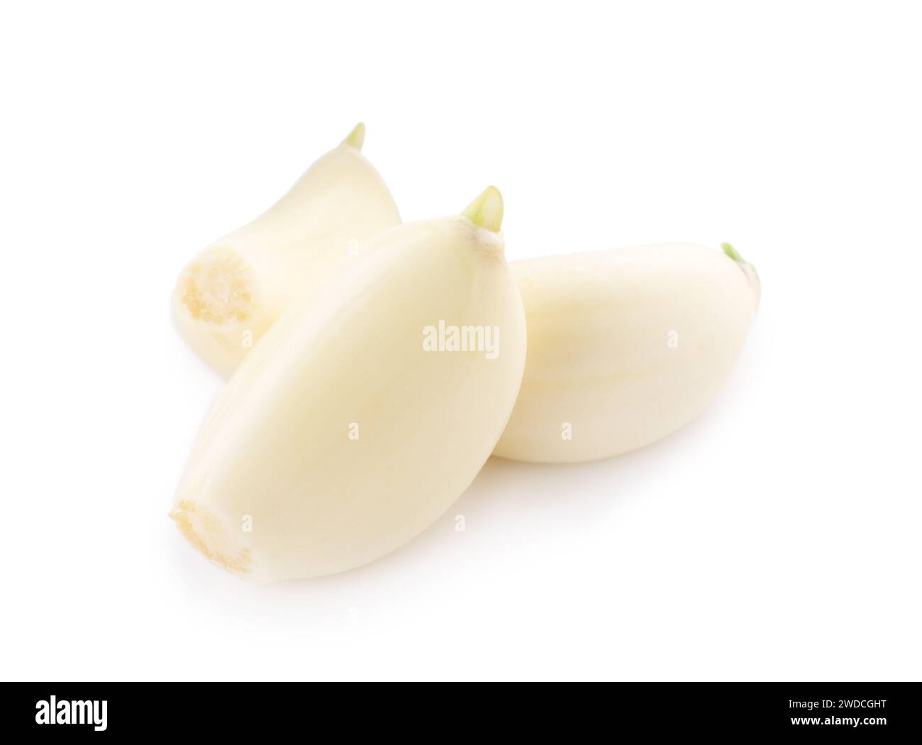Peeled cloves of garlic isolated on white Stock Photo - Alamy