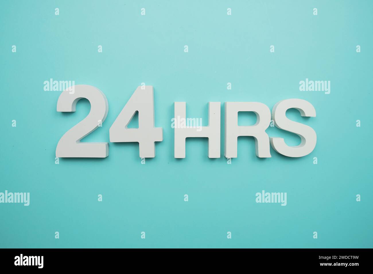 24 Leters 24 Hours alphabet letters on blue background Stock Photo - Alamy
