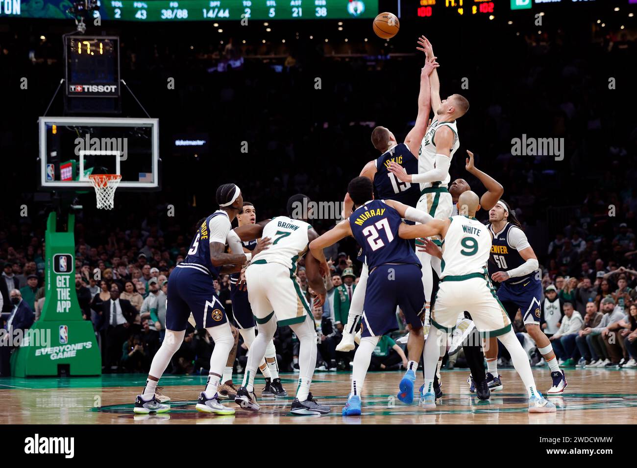 Denver Nuggets' Nikola Jokic (15) and Boston Celtics' Kristaps