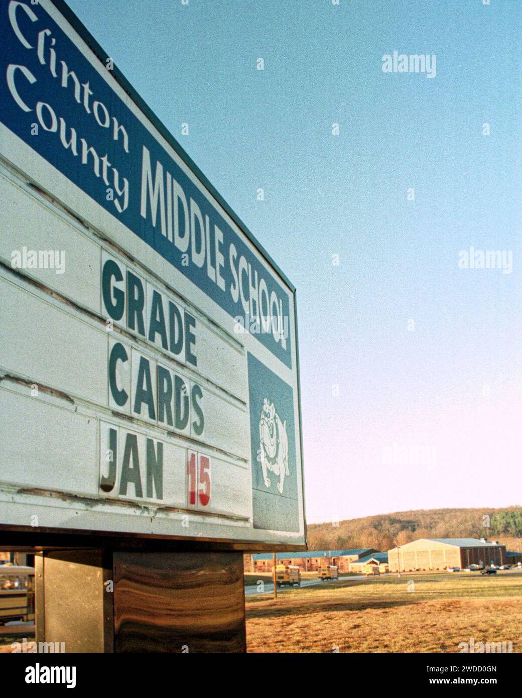 School buses loaded with students pull into the Clinton County Middle