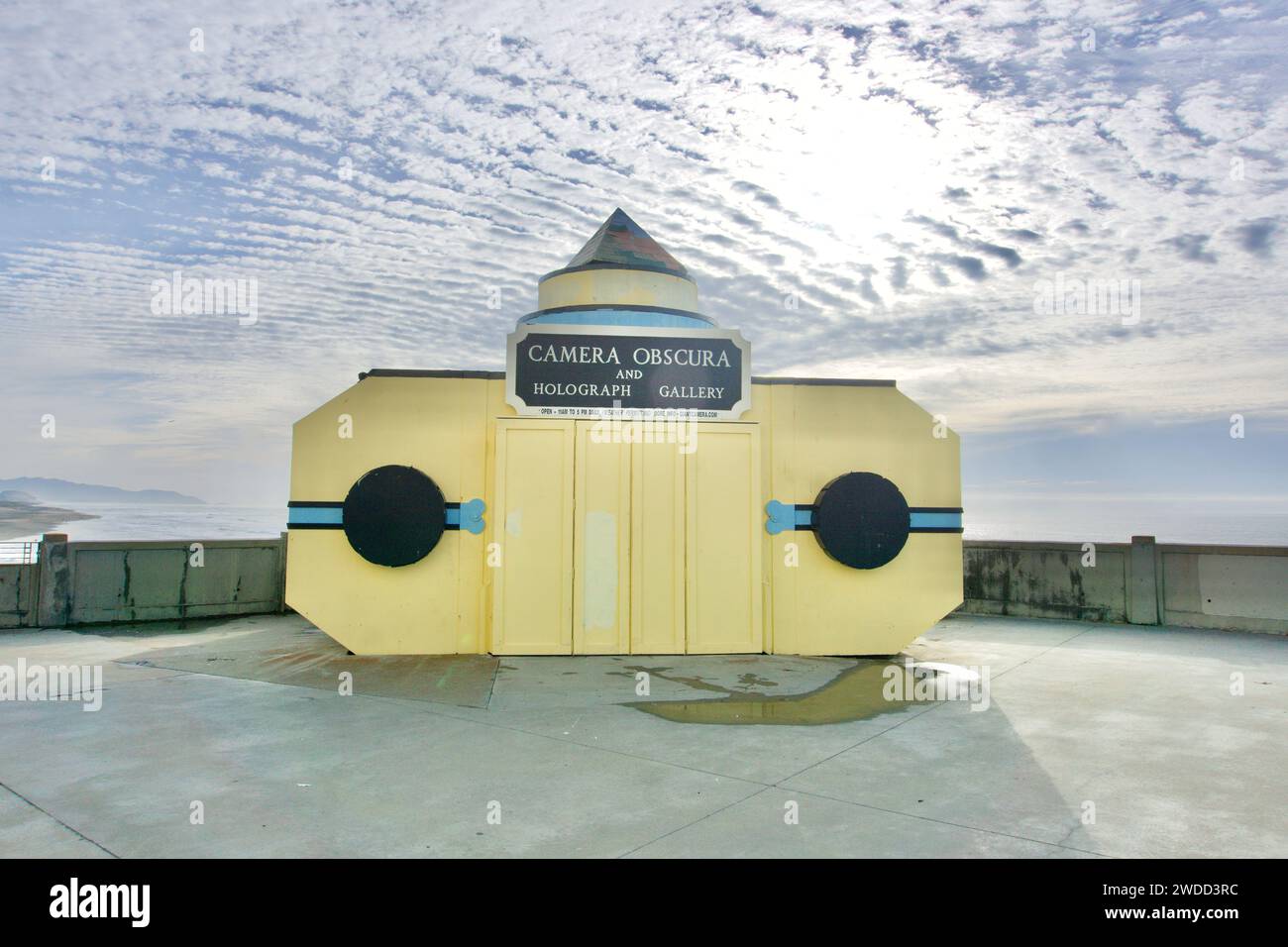 The Giant Camera or Camera Obscura, a historic landmark and tourist attraction, sits beside the Cliff House at Ocean Beach in San Francisco, CA. Stock Photo