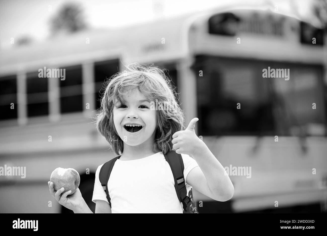 Happy school kids on school bus. Child thumbs up smiling and happy ...