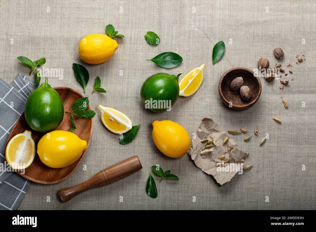 lemon with lime and slices on canvas background Stock Photo