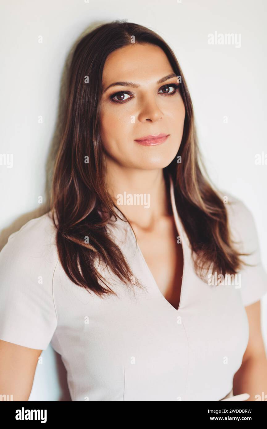 Close up portrait of young beautiful brunette woman Stock Photo - Alamy