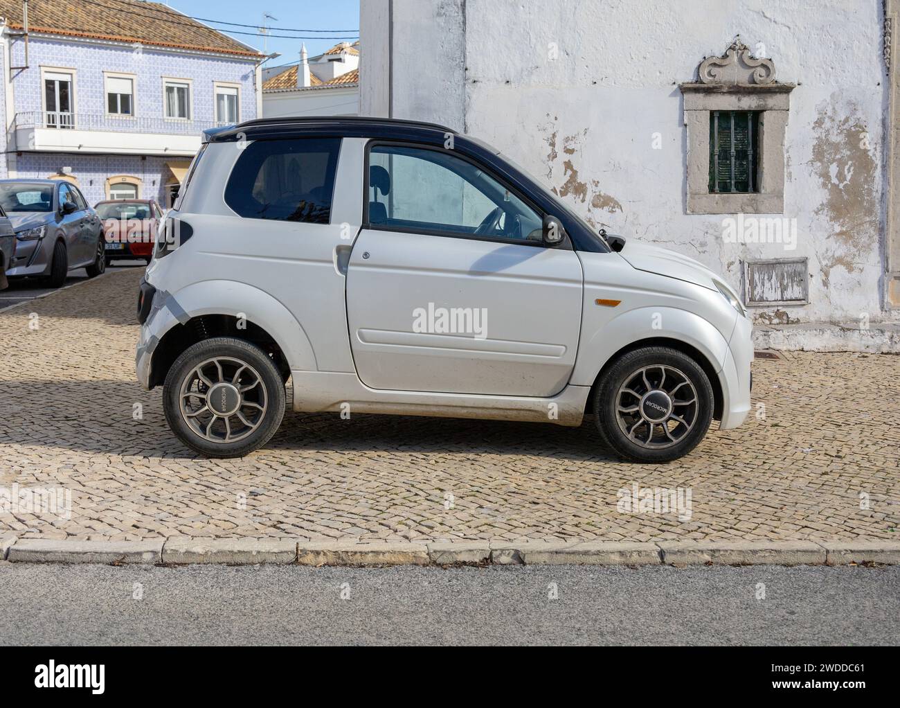 Small Smart Microcar Mg.Go Car Portugal Stock Photo