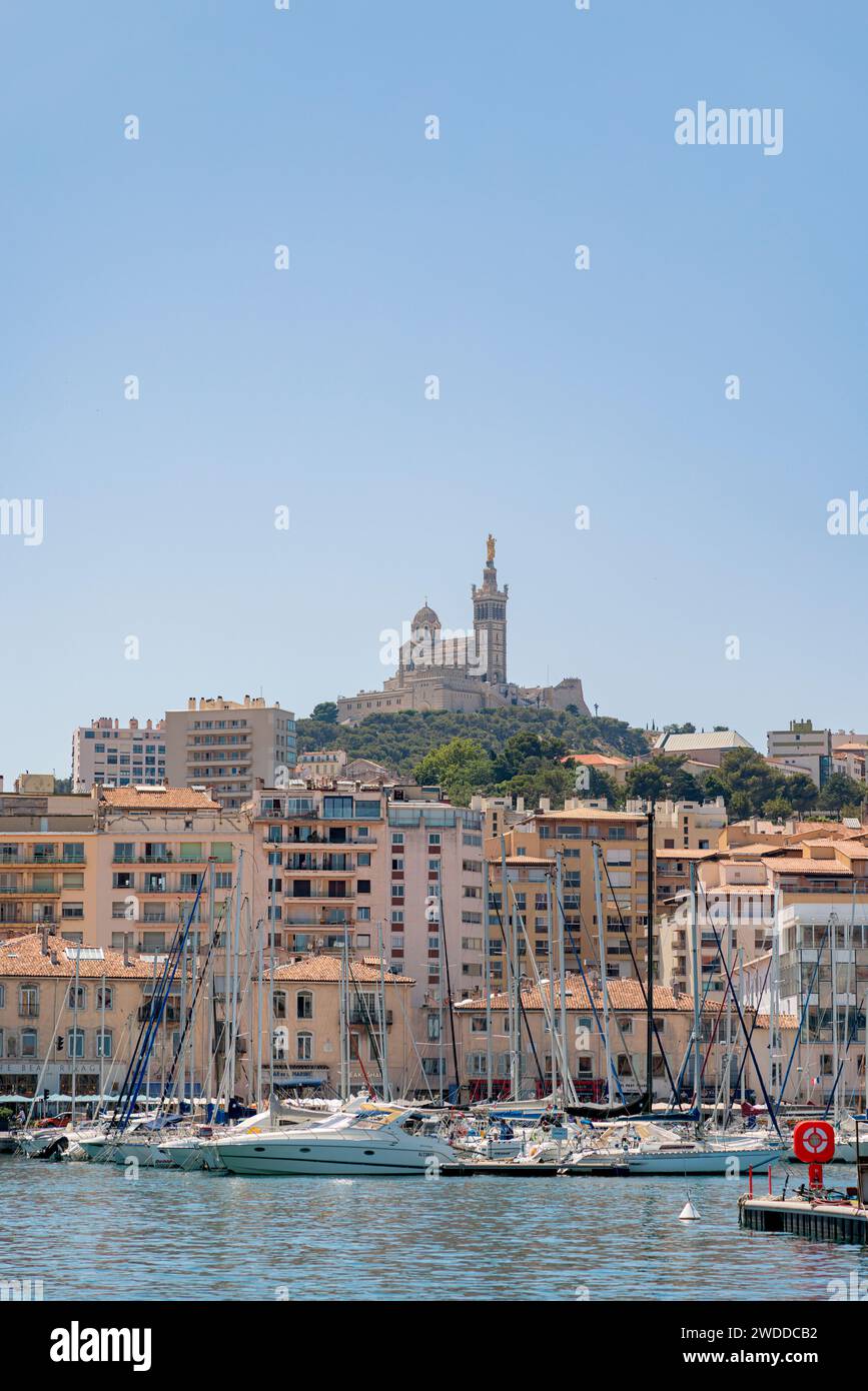 Photograph taken in the city of Marseille, France, featuring a view of Notre Dame de la Garde captured from the old port Stock Photo