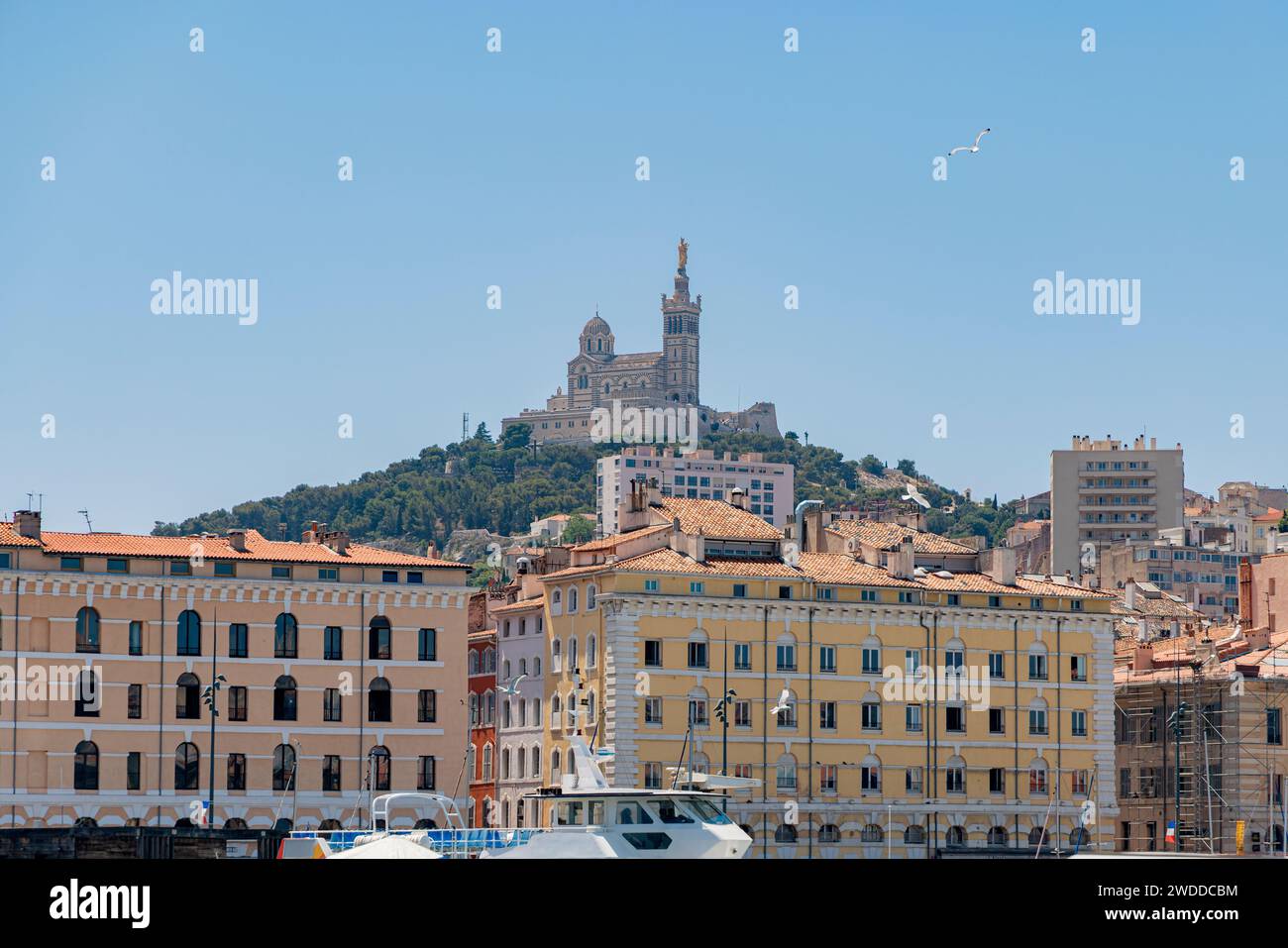 Photograph taken in the city of Marseille, France, featuring a view of Notre Dame de la Garde captured from the old port Stock Photo