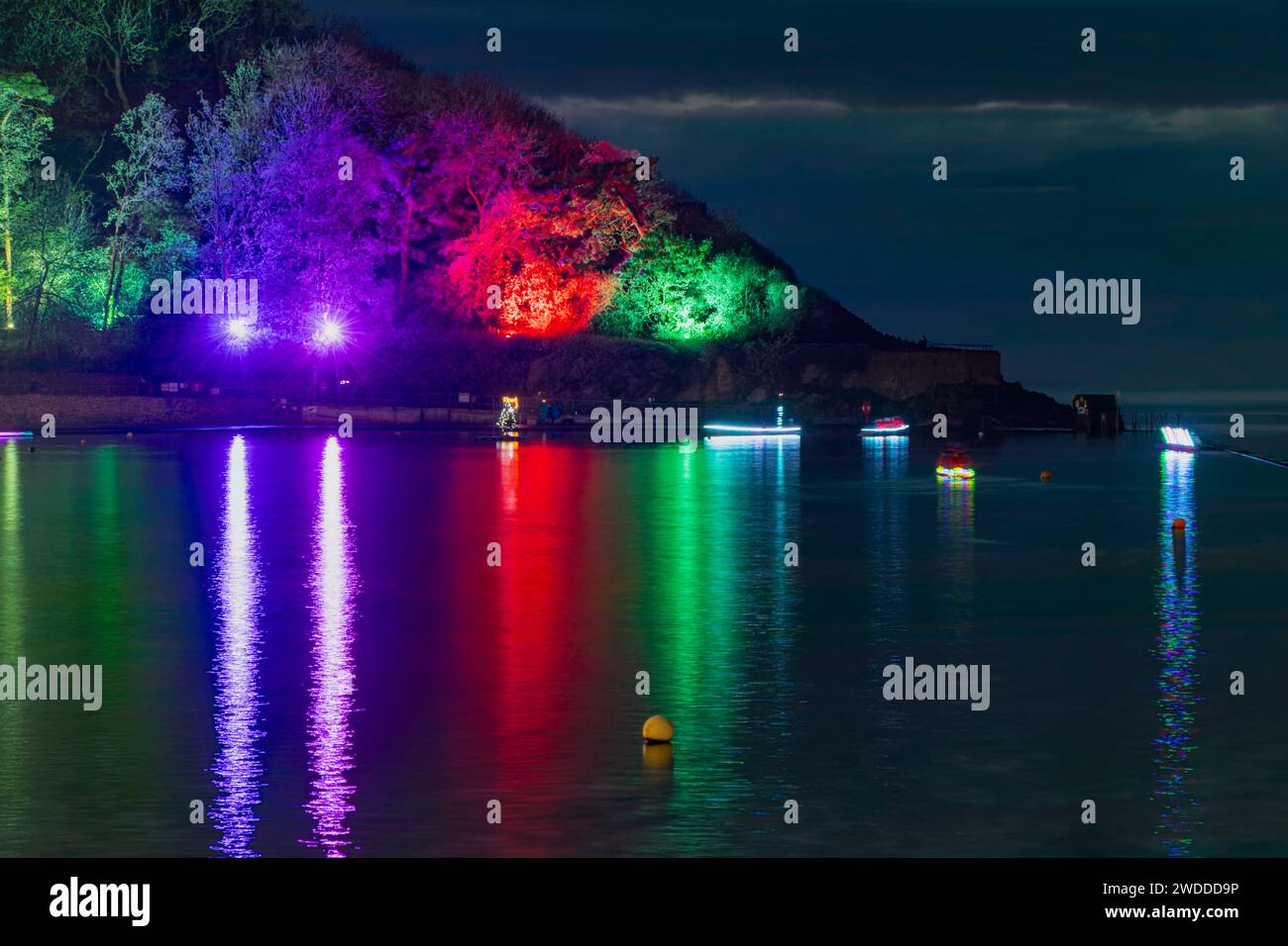 Boats with lights on on the marine lake Stock Photo