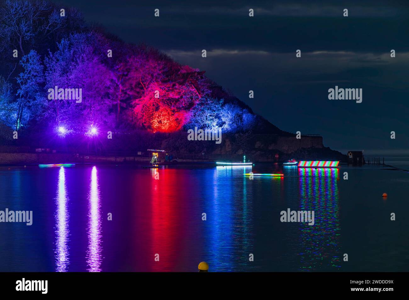 Boats with lights on on the marine lake Stock Photo