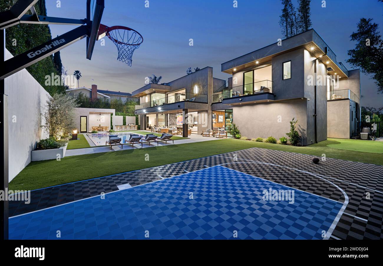 View of Spacious home featuring an outdoor basketball court with hoop, New ...