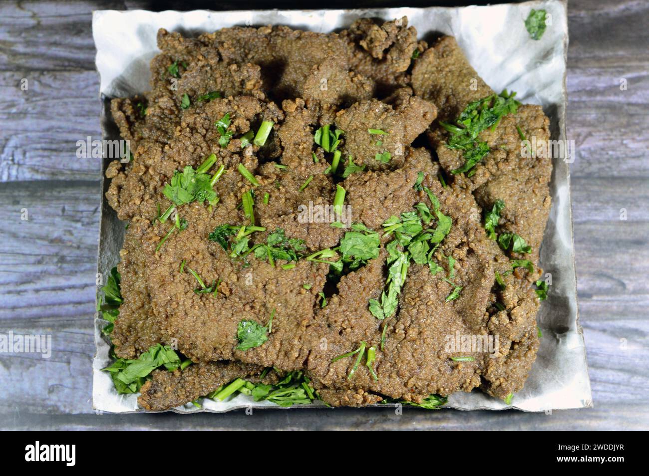 Traditional Arabic deep fried beef liver slices, beef liver covered