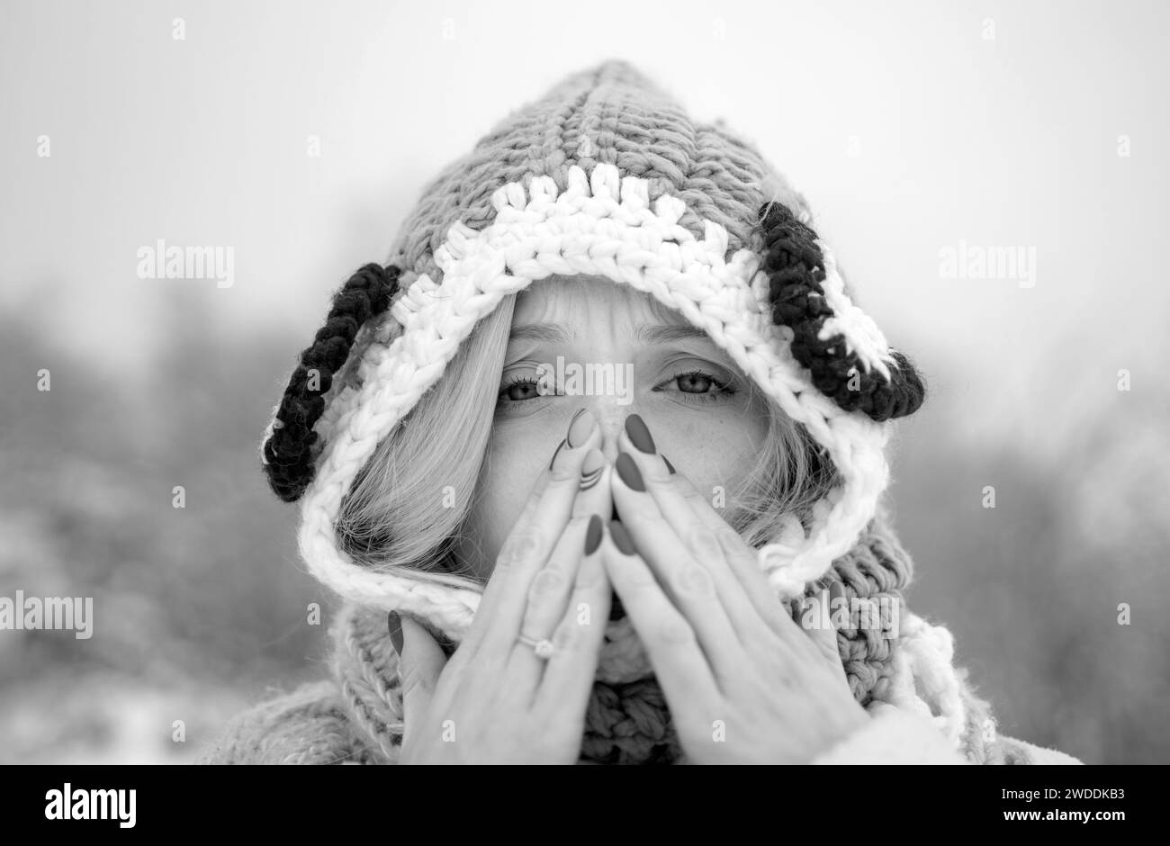 Woman with winter allergy symptoms blowing nose. Portrait Of Young