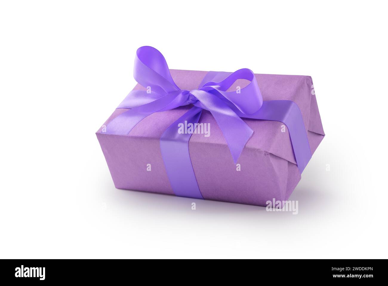 Purple paper present box with ribbon bow isolated on white background ...