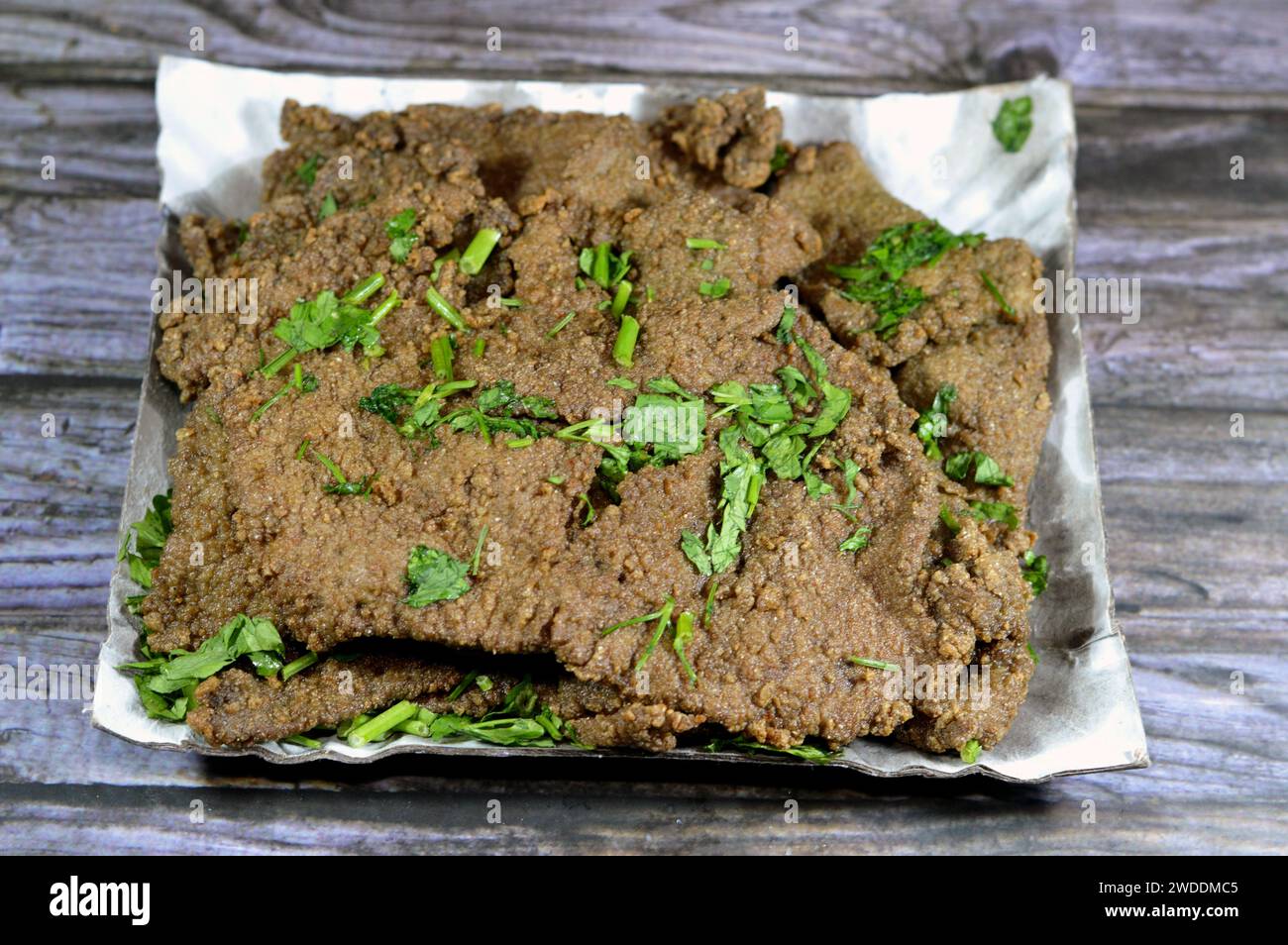 Traditional Arabic deep fried beef liver slices, beef liver covered
