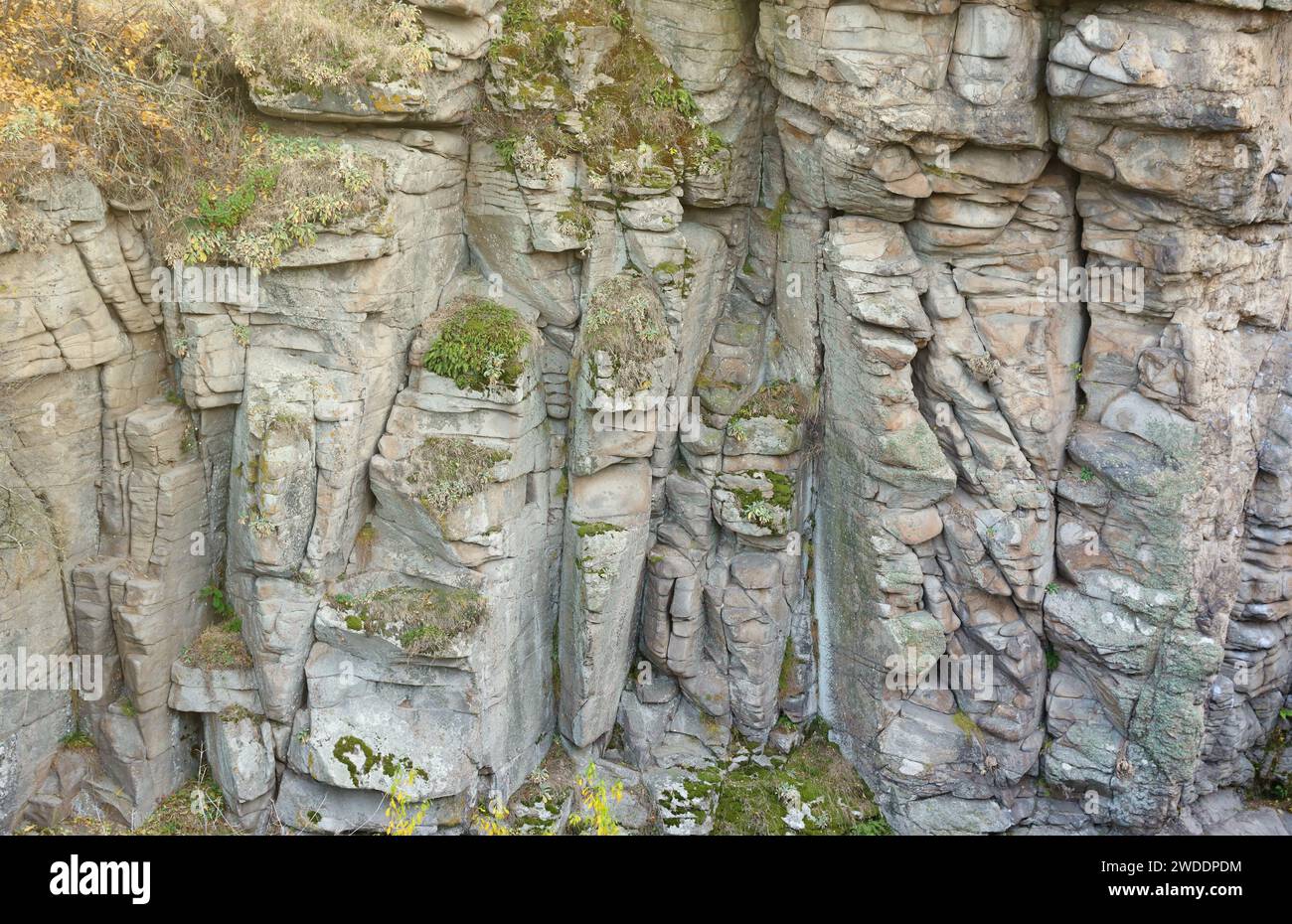 Light coarse natural rock stone background. Mining cliff rough front ...