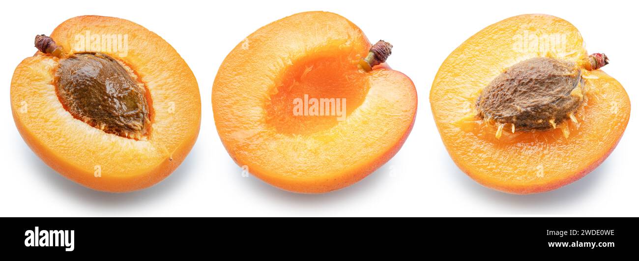 Set of ripe apricot halves on white background. File contains clipping ...