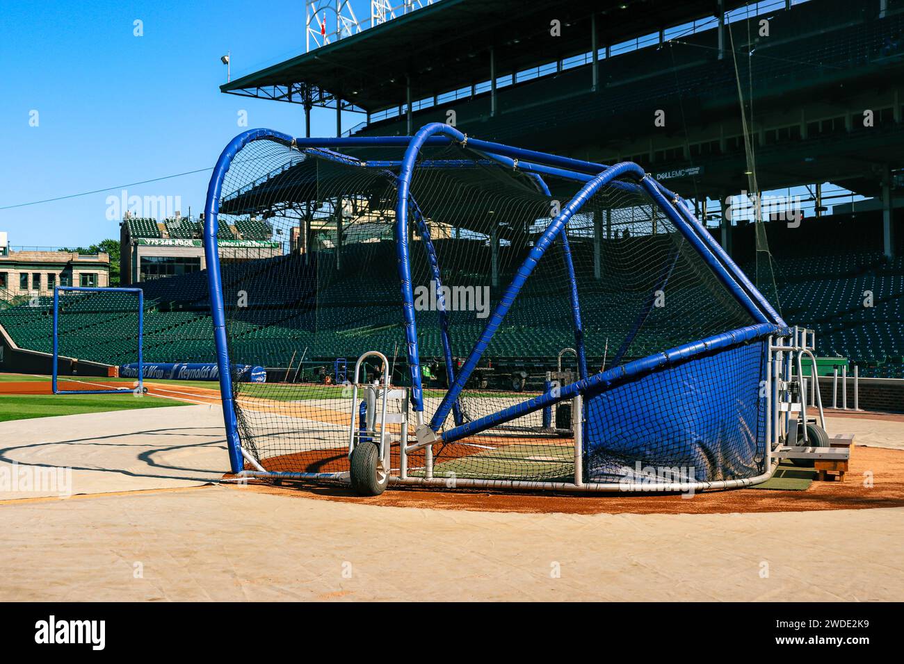 Batting cage on an empty Wrigley field on a sunny afternoon Stock Photo