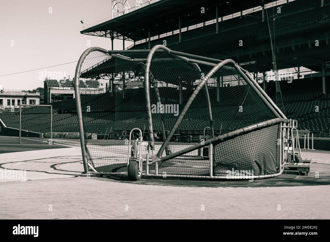 Batting cage on an empty Wrigley field in black and white Stock Photo