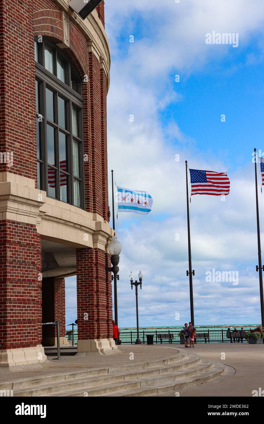 Navy Pier, Chicago's waterfront boardwalk lined with American flags and the Chicago flag Stock Photo