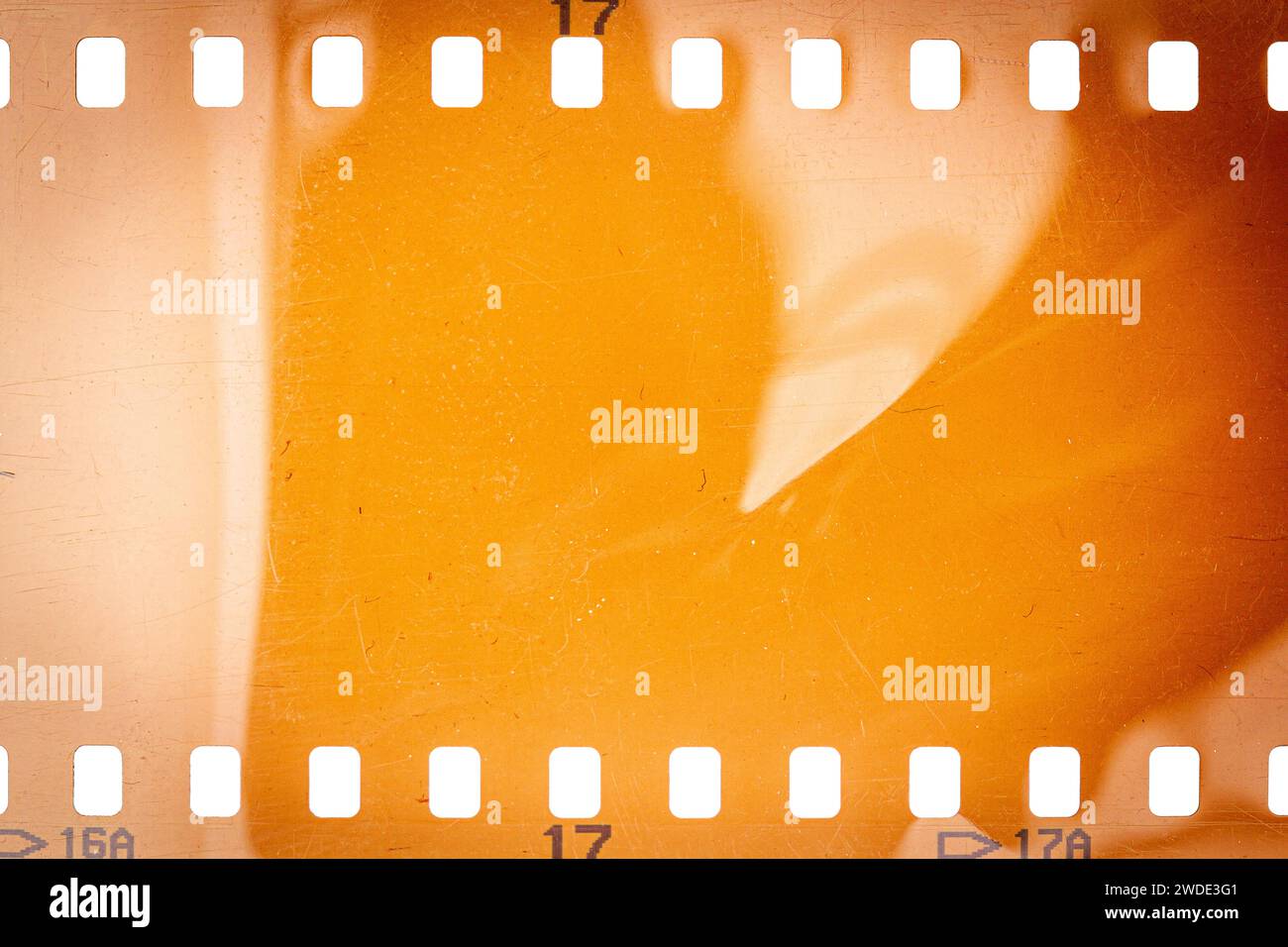Dusty and grungy 35mm film texture or surface. Perforated scratched ...