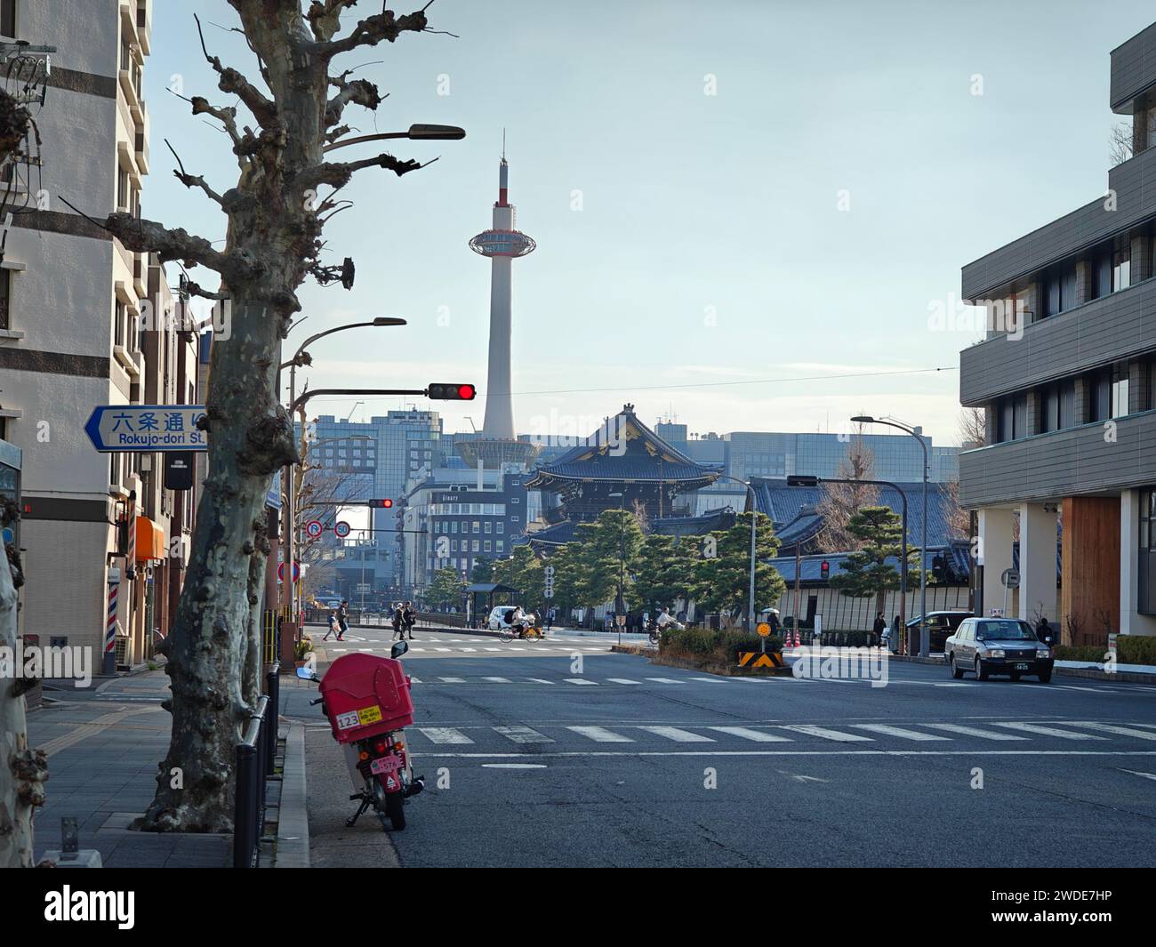 A street scene showing Kyoto Tower in Kyoto, Japan Stock Photo