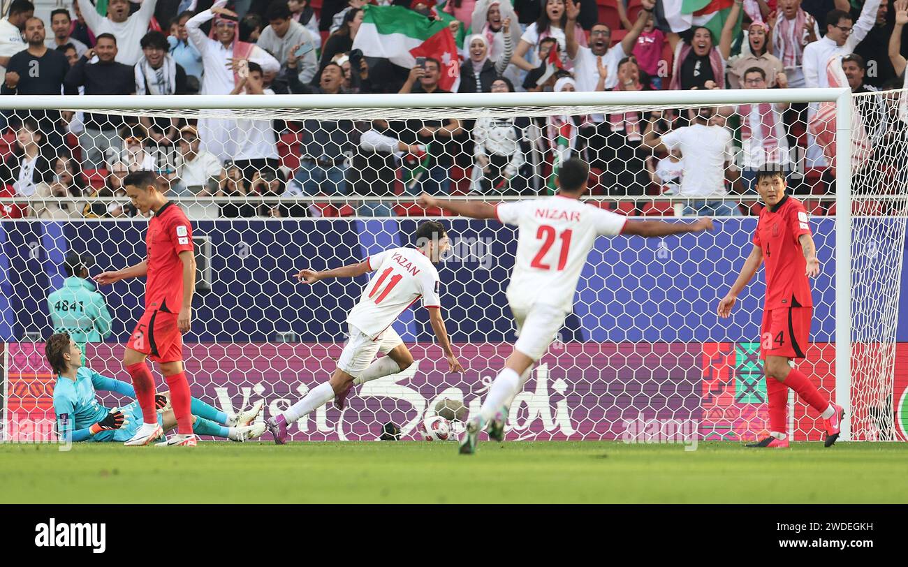 Doha, Qatar. 20th Jan, 2024. Yazan Alnaimat (C) of Jordan celebrates