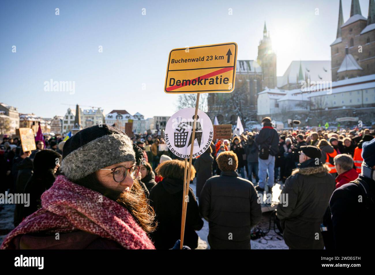 Erfurt, Germany. 20th Jan, 2024. A demonstrator stands in front of 