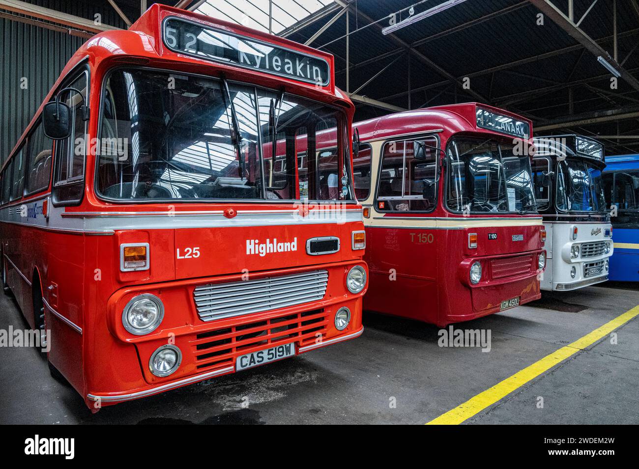 Vintage buses in Bridgeton Bus Garage, Glasgow, Scotland. Stock Photo