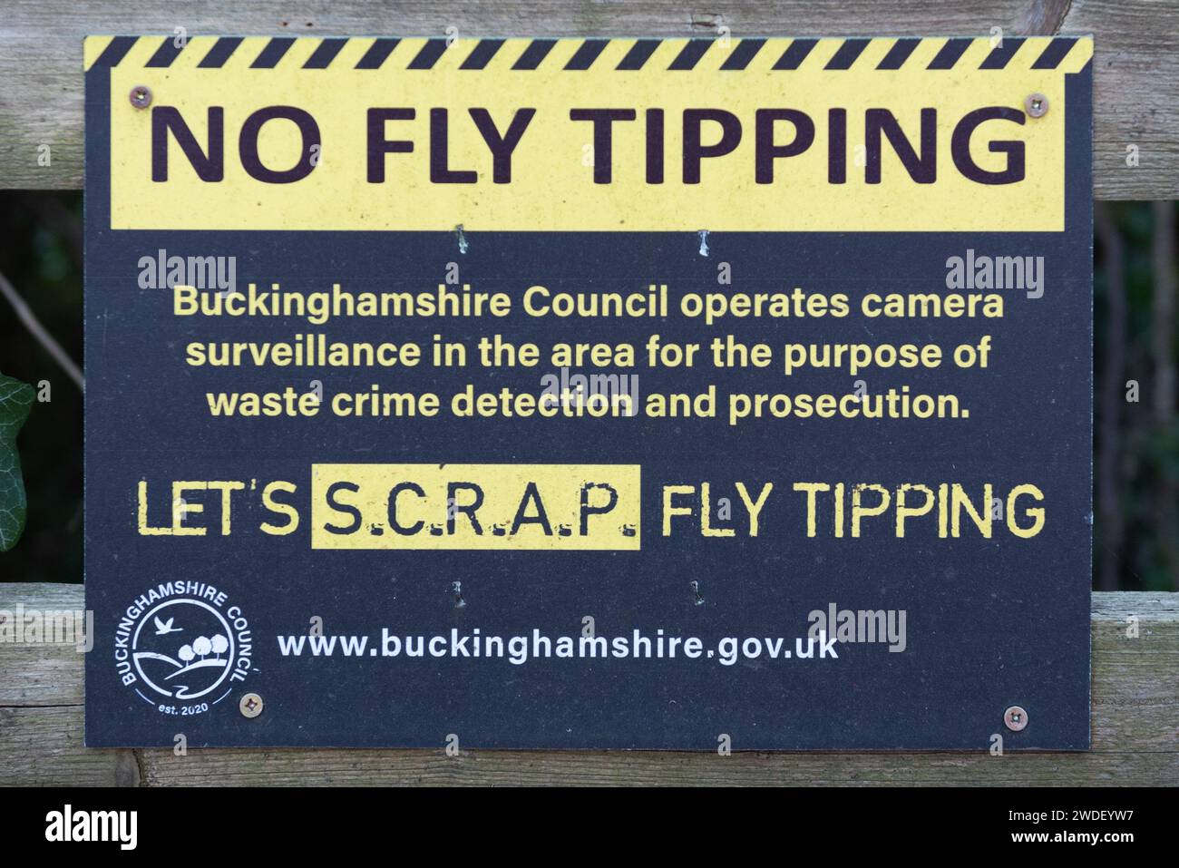 No Fly Tipping Sign by the Buckinghamshire Council, Lets S.C.R.A.P Fly Tipping Stock Photo