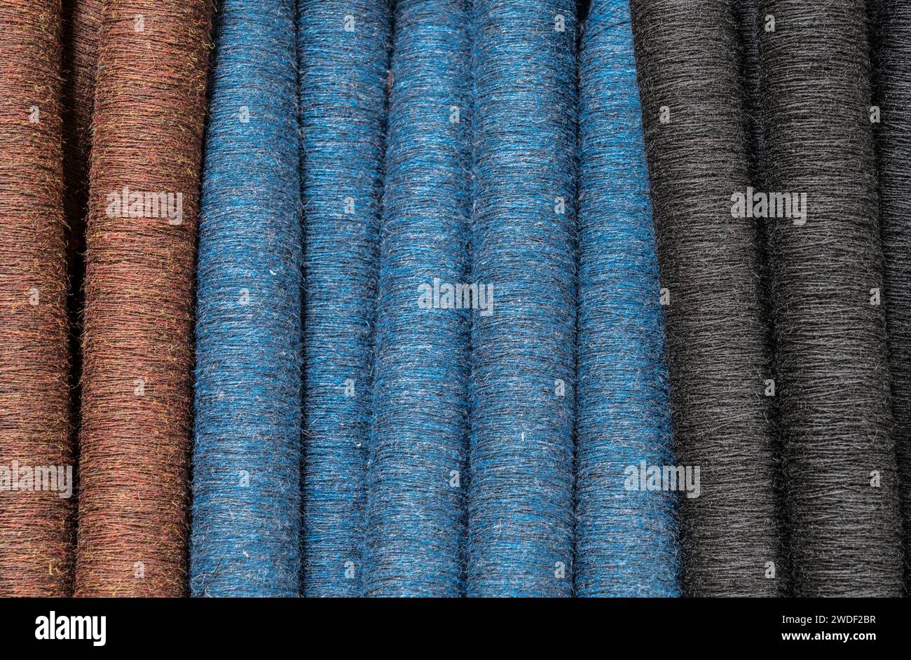 spools of colorful fabrics Stock Photo