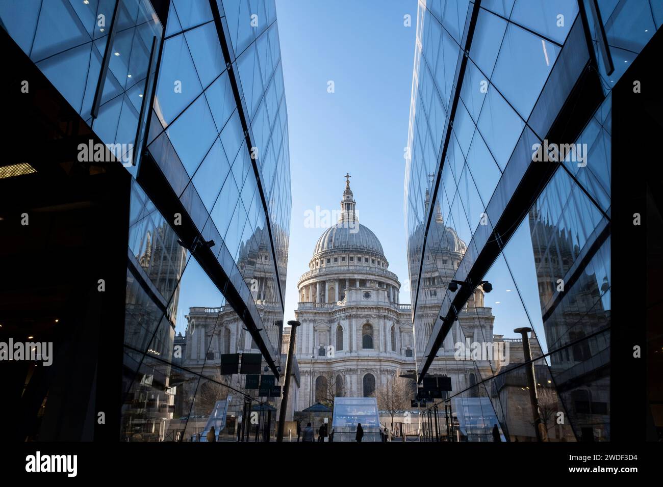 St Paul’s Cathedral viewed from One New Change shopping centre in the City of London on 18th January 2024 in London, United Kingdom. St Pauls Cathedral is an Anglican cathedral in London. As the seat of the Bishop of London, the cathedral serves as the mother church of the Diocese of London. It sits on Ludgate Hill at the highest point of the City of London and is a Grade I listed building. Stock Photo