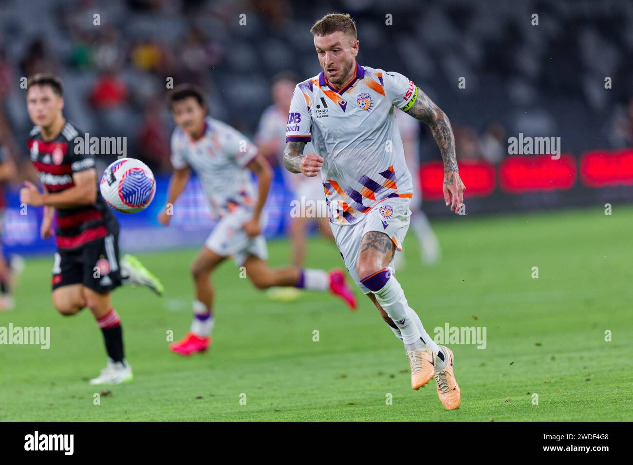 Sydney, Australia. 20th Jan, 2024. Adam Taggart of Perth Glory chases down the ball during the A-League Men Rd13 match between the Wanderers and Perth Glory at CommBank Stadium on January 20, 2024 in Sydney, Australia Credit: IOIO IMAGES/Alamy Live News Stock Photo