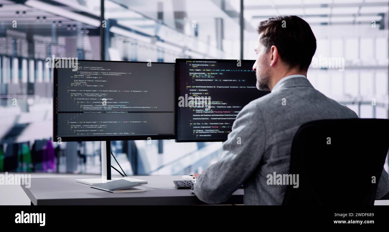 Web Developer Coding On Computer To Develop Code Stock Photo - Alamy