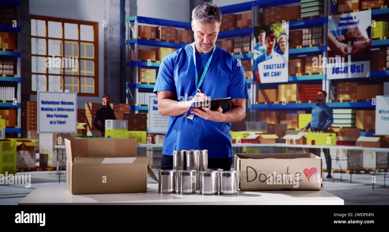 Male volunteer donation boxes hi-res stock photography and images - Alamy