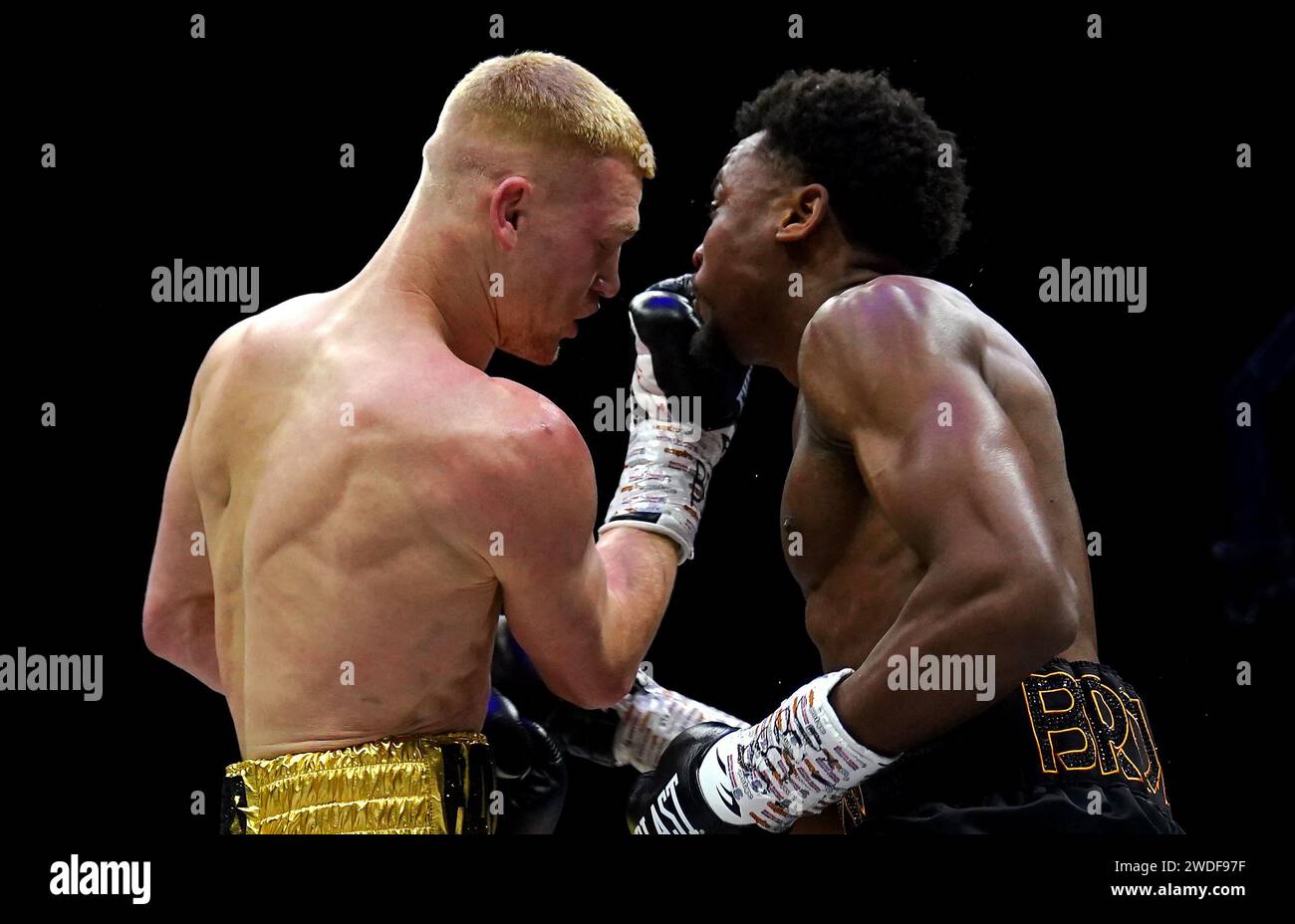 Boxer Mark Jeffers (left) strikes Germaine Brown during the Super-Middle Title bout at the M&S Bank Arena, Liverpool. Picture date: Saturday January 20, 2024. Stock Photo