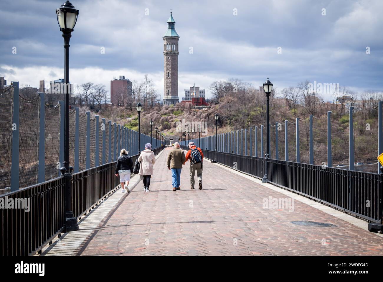 Walking across The Highbridge from The Bronx towards Highbridge Park