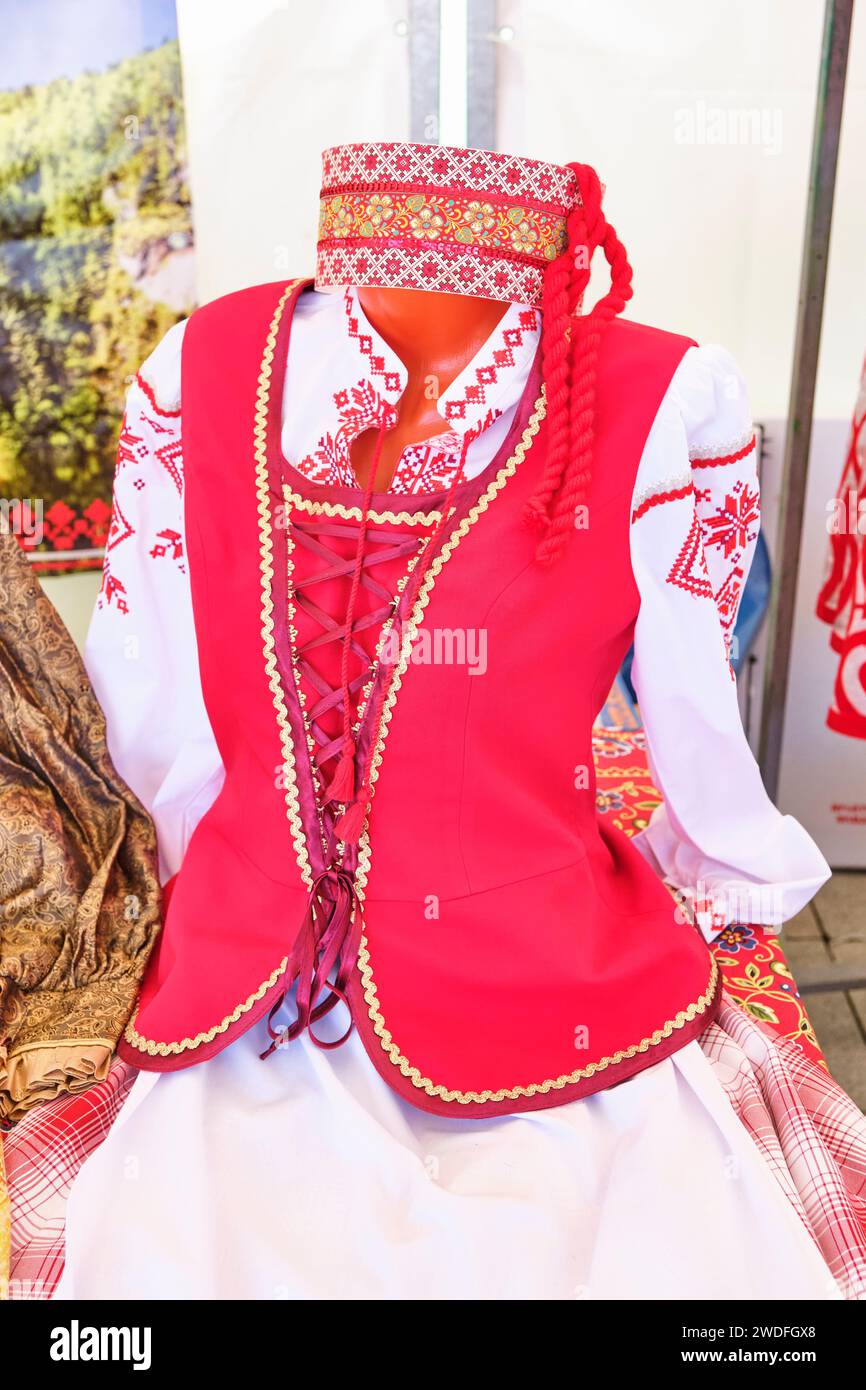 Stylized Belarusian national female costume on mannequin. Stock Photo