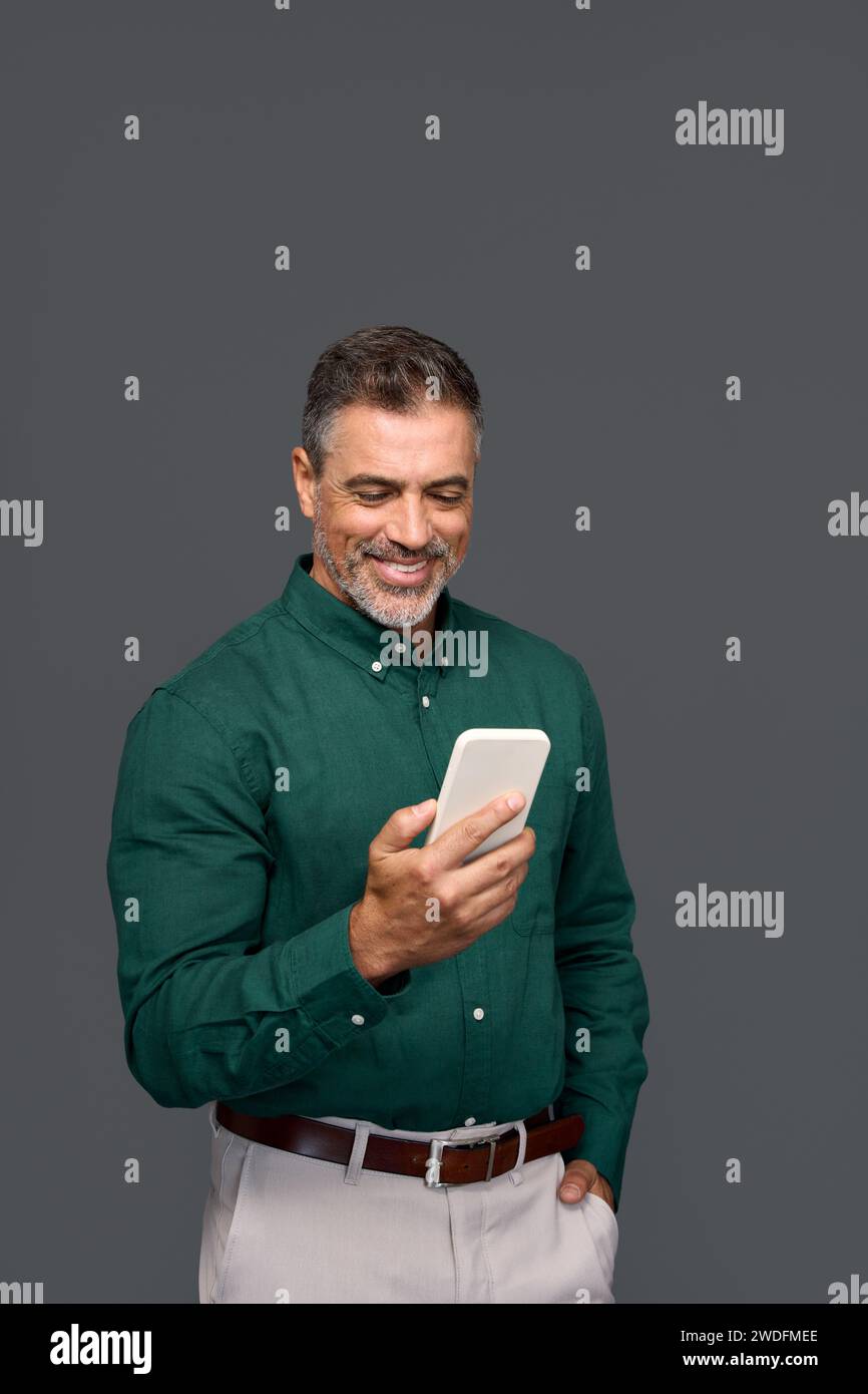 Happy older man using phone hi-res stock photography and images - Alamy
