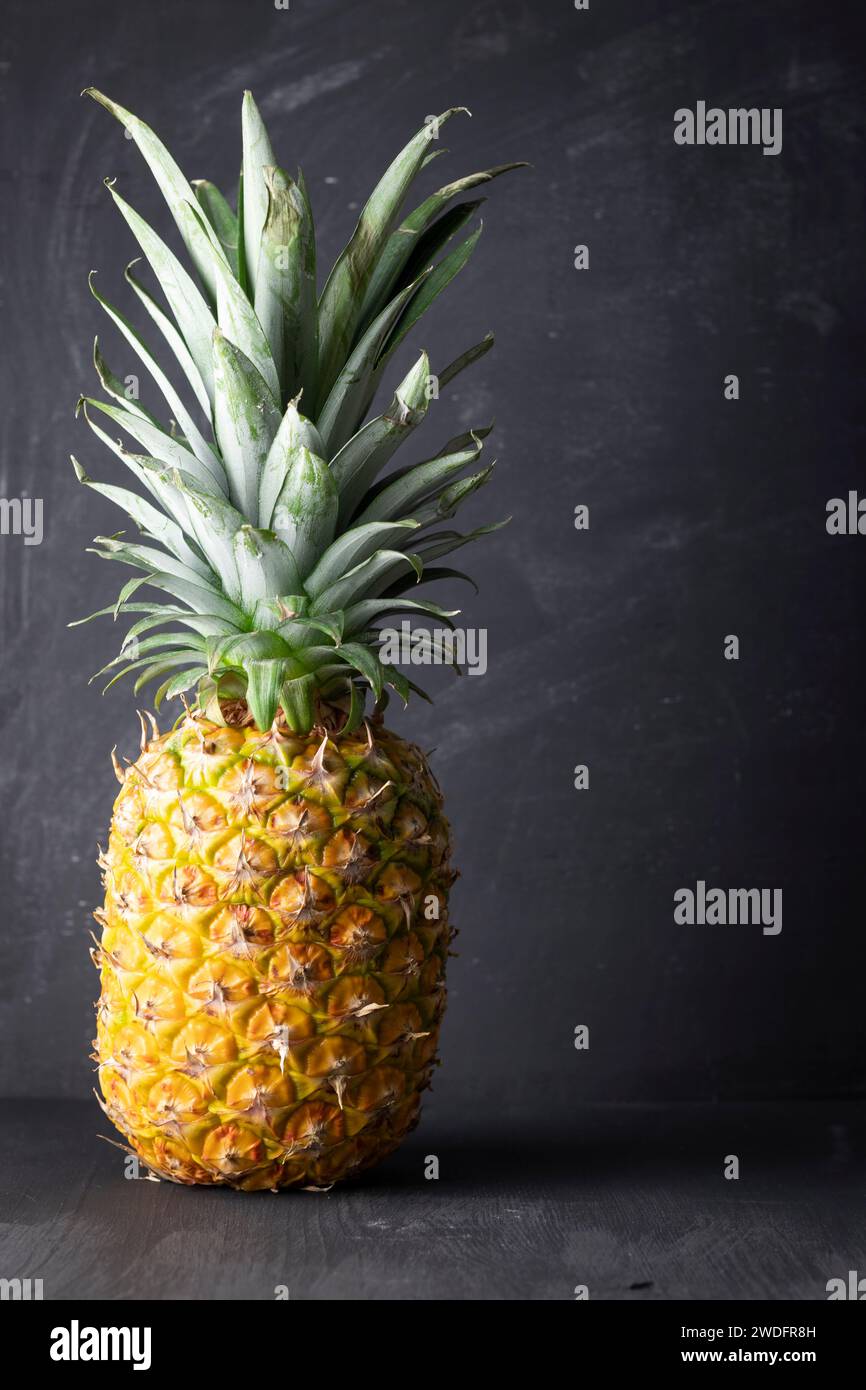 Vibrant pineapple photography on black background Stock Photo