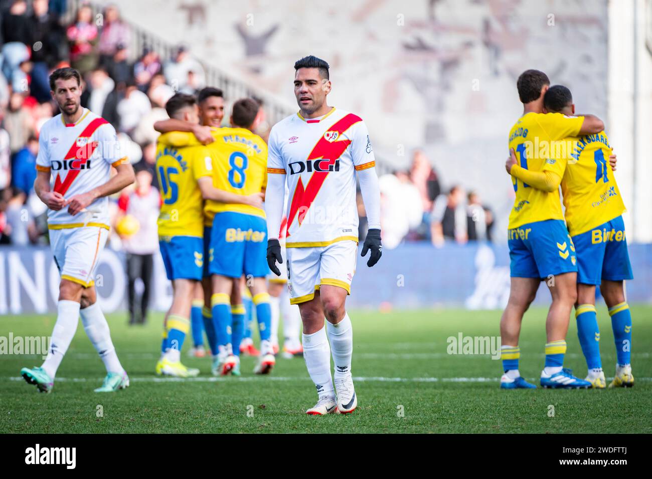 Madrid, Spain. 20th Jan, 2024. Radamel Falcao Garcia (R) and Florian Lejeune (L) of Rayo Vallecano seen leaving the field while Las Palmas players celebrate the victory at the end of the La Liga EA Sports 2023/24 football match between Rayo Vallecano vs Las Palmas at Estadio Vallecas. Final score; Rayo Vallecano 0 : 2 Las Palmas. Credit: SOPA Images Limited/Alamy Live News Stock Photo